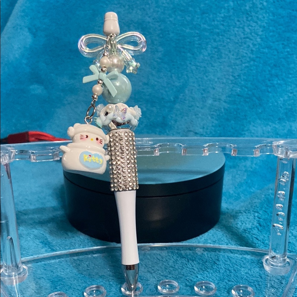 Cute Pen with Charms and bows.